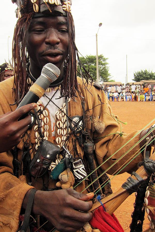 Dozo singer with charms in Daloa, Côte d'Ivoire